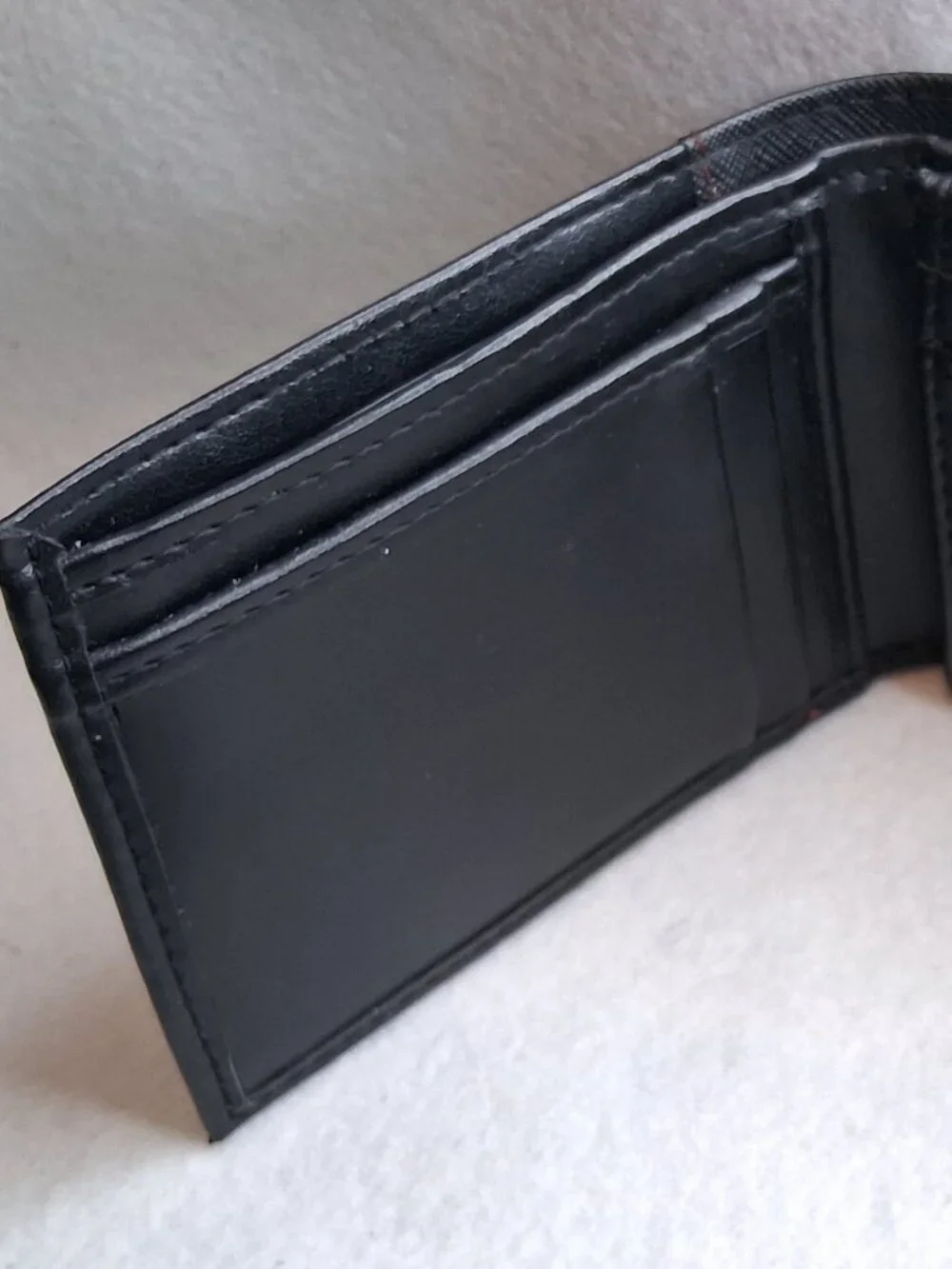 GUESS Men’s Black Saffiano Passcase Bifold Wallet Red Stitching Accent